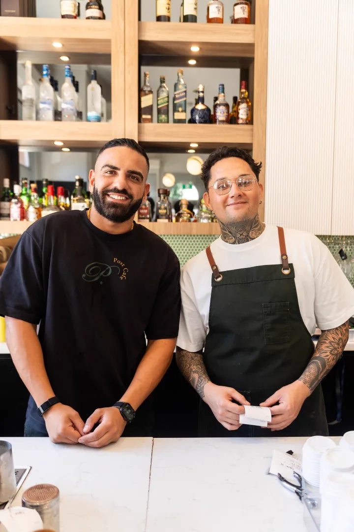 Two of the Post Café team behind the counter